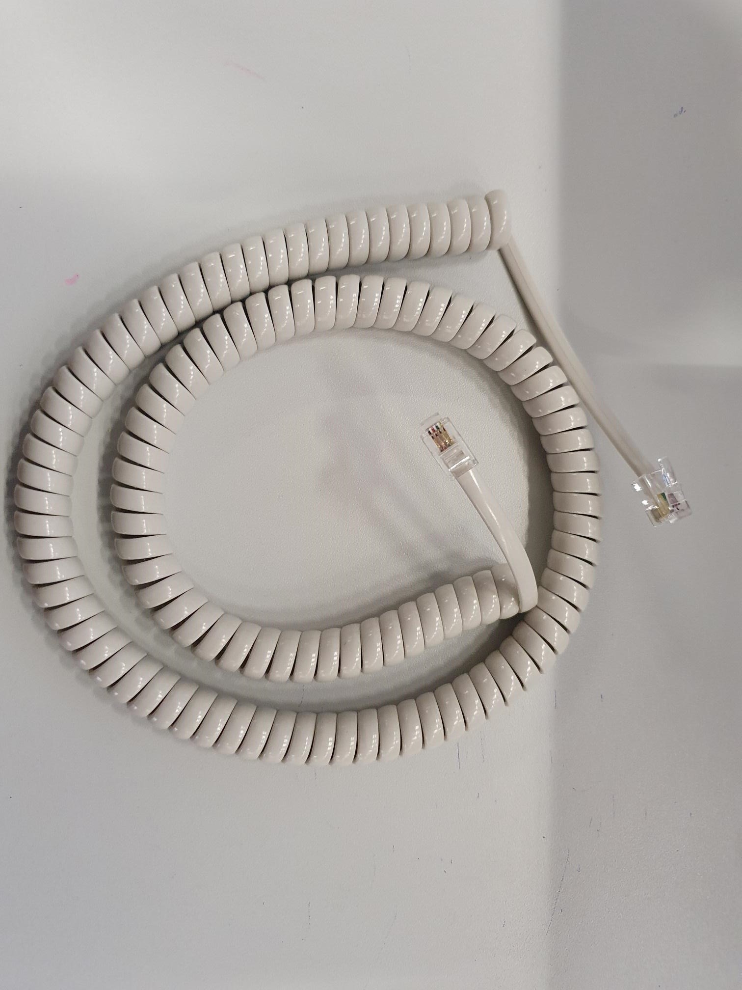Cavo a spirale del ricevitore Helos lungo, grigio chiaro, sciolto